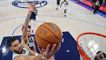 Jun 12, 2024; Dallas, Texas, USA; Boston Celtics forward Jayson Tatum (0) shoots the ball against Dallas Mavericks center Dereck Lively II (2) during the second quarter during game three of the 2024 NBA Finals at American Airlines Center. Mandatory Credit: Stacy Revere/Pool Photo-USA TODAY Sports